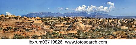 "Overlooking the Petrified Dunes towards the La Sal Mountains in the distance, Arches-Nationalpark, near Moab, Utah, United States, North America" View Large Photo Image Stock Photograph - "Overlooking the Petrified Dunes towards the La Sal Mountains in the distance, Arches-Nationalpark, near Moab, Utah, United States, North America". Fotosearch