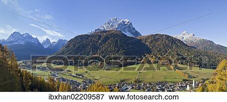 "Overlooking the town of Sesto, Sexten, with Dreischusterspitze or Punta dei Tre Scarperi and Croda dei Baranci or Birkenkofel mountains, South Tyrol, Italy, Europe" View Large Photo Image Stock Photo - "Overlooking the town of Sesto, Sexten, with Dreischusterspitze or Punta dei Tre Scarperi and Croda dei Baranci or Birkenkofel mountains, South Tyrol, Italy, Europe". Fotosearch