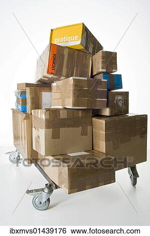 Packages on a push cart View Large Photo Image Stock Photograph - Packages on a push cart. Fotosearch