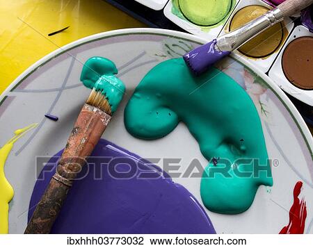Stock Image - Paint brush with artists' paints. Fotosearch
