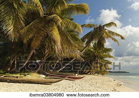 "Palm beach with fishing boats and fishing nets, Sainte Marie, Madagascar, Africa" View Large Photo Image Stock Image - "Palm beach with fishing boats and fishing nets, Sainte Marie, Madagascar, Africa". Fotosearch
