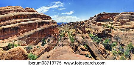 "Panorama in Devil's Garden, with rock formations formed by the erosion of red Navajo sandstone, Arches-Nationalpark, near Moab, Utah, United States, North America" View Large Photo Image Stock Photography - "Panorama in Devil's Garden, with rock formations formed by the erosion of red Navajo sandstone, Arches-Nationalpark, near Moab, Utah, United States, North America". Fotosearch