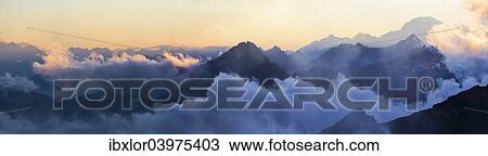 "Panorama of the Alps at sunset in the fog, from Mantova Hut, Monte Rosa, Alps, Valle d'Aosta, Italy, Europe" View Large Photo Image Stock Image - "Panorama of the Alps at sunset in the fog, from Mantova Hut, Monte Rosa, Alps, Valle d'Aosta, Italy, Europe". Fotosearch