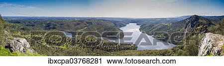 "Panorama of the dammed Rio Tajo in Monfraguee National Parks, UNESCO biosphere reserve, Extremadura, Spain, Europe" View Large Photo Image Stock Image - "Panorama of the dammed Rio Tajo in Monfraguee National Parks, UNESCO biosphere reserve, Extremadura, Spain, Europe". Fotosearch