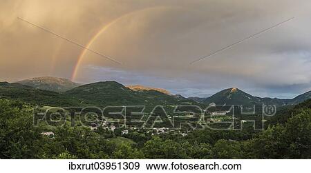 "Panorama with rainbow after thunderstorm over the valley of Castellane, Alpes-de-Haute-Provence, Provence-Alpes-Cote d'Azur, France, Europe" View Large Photo Image Stock Photo - "Panorama with rainbow after thunderstorm over the valley of Castellane, Alpes-de-Haute-Provence, Provence-Alpes-Cote d'Azur, France, Europe". Fotosearch