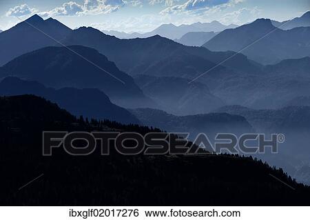 "Panoramic view from Untersberg, Loferer Steinberge mountain range, Wilder Kaiser mountain and misty valleys, Groedig, Salzburg, Austria, Europe" View Large Photo Image Stock Photograph - "Panoramic view from Untersberg, Loferer Steinberge mountain range, Wilder Kaiser mountain and misty valleys, Groedig, Salzburg, Austria, Europe". Fotosearch