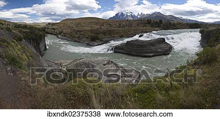 Stock Photo - "Panoramic view of a waterfall of the glacial river Rio Paine, Torres del Paine National Park, Lake Pehoe, Magallanes Region, Patagonia, Chile, South America, Latin America, America, South America". Fotosearch