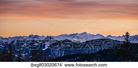 "Panoramic view of the Alps at sunset, from Mt Bruennstein, Bavarian Alps, Brunnstein, Oberaudorf, Bavaria, Germany, Europe" View Large Photo Image Picture - "Panoramic view of the Alps at sunset, from Mt Bruennstein, Bavarian Alps, Brunnstein, Oberaudorf, Bavaria, Germany, Europe". Fotosearch