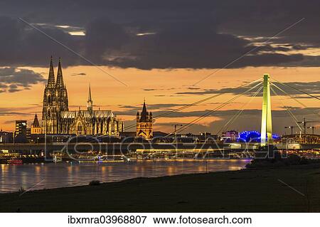 "Panoramic view of the Rhine with Cologne Cathedral, Severinsbrucke Bridge, the Musical Dome and Great St. Martin Church, at dusk, Cologne, North Rhine-Westphalia, Germany, Europe" View Large Photo Image Stock Photo - "Panoramic view of the Rhine with Cologne Cathedral, Severinsbrucke Bridge, the Musical Dome and Great St. Martin Church, at dusk, Cologne, North Rhine-Westphalia, Germany, Europe". Fotosearch