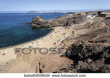 "Papagayo beaches or Playas de Papagayo, Playa Blanca in the back, Lanzarote, Canary Islands, Spain, Europe" View Large Photo Image Picture - "Papagayo beaches or Playas de Papagayo, Playa Blanca in the back, Lanzarote, Canary Islands, Spain, Europe". Fotosearch