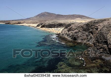 Stock Photo - "Papagayo beaches or Playas de Papagayo, Hacha Grande in the back, Lanzarote, Canary Islands, Spain, Europe". Fotosearch