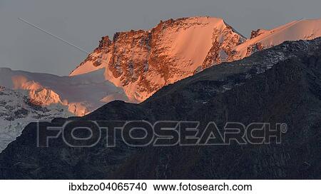 "Paradiso group at sunrise, alpenglow, Gran Paradiso National Park, Valle di Cogne, Piedmont, Italy, Europe" View Large Photo Image Stock Image - "Paradiso group at sunrise, alpenglow, Gran Paradiso National Park, Valle di Cogne, Piedmont, Italy, Europe". Fotosearch
