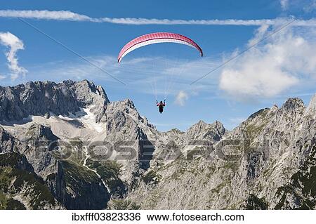 "Paraglider, Hollental or Hell Valley, Hollentalferner glacier, Waxensteinkamm crest, Zugspitze mountain, Wetterstein mountains, Grainau, Werdenfelser Land, Bavaria, Germany, Europe" View Large Photo Image Stock Photograph - "Paraglider, Hollental or Hell Valley, Hollentalferner glacier, Waxensteinkamm crest, Zugspitze mountain, Wetterstein mountains, Grainau, Werdenfelser Land, Bavaria, Germany, Europe". Fotosearch