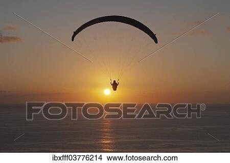 "Paraglider over the Atlantic Ocean with sunset, Canary Islands, Spain, Europe" View Large Photo Image Picture - "Paraglider over the Atlantic Ocean with sunset, Canary Islands, Spain, Europe". Fotosearch