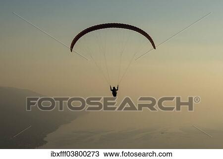 "Paragliding, clouds, Lake Garda, Veneto, Italy, Europe" View Large Photo Image Stock Image - "Paragliding, clouds, Lake Garda, Veneto, Italy, Europe". Fotosearch