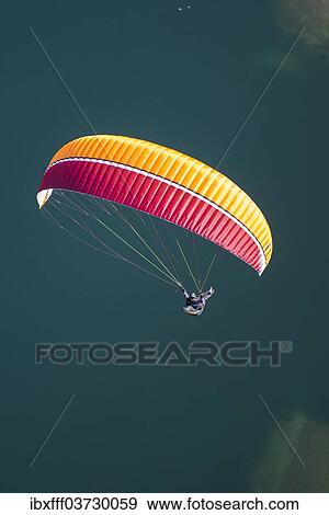 "Paragliding over Lake Maggiore, Locarno, Kanton Tessin, Switzerland, Europe" View Large Photo Image Stock Photo - "Paragliding over Lake Maggiore, Locarno, Kanton Tessin, Switzerland, Europe". Fotosearch