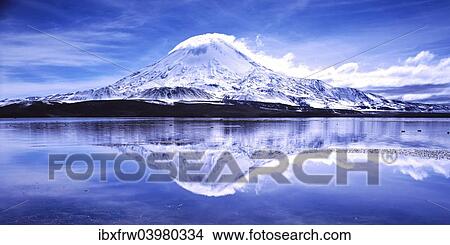 Picture - "Parinacota volcano with reflections in the lake Lago Chungara, Lauca National Park, Antofagasta, Chile, South America". Fotosearch