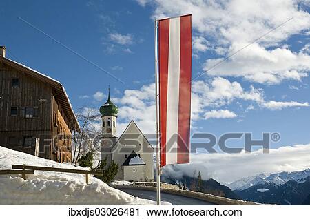 "Parish and pilgrimage church of St. Bartholomew, Baroque church, with an Austrian flag, Bartholomaberg, Montafon, Vorarlberg, Austria, Europe" View Large Photo Image Stock Image - "Parish and pilgrimage church of St. Bartholomew, Baroque church, with an Austrian flag, Bartholomaberg, Montafon, Vorarlberg, Austria, Europe". Fotosearch