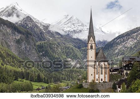Stock Photo - "Parish church of Heiligenblut, Grossglockner, Heiligenblut, Carinthia, Austria, Europe". Fotosearch
