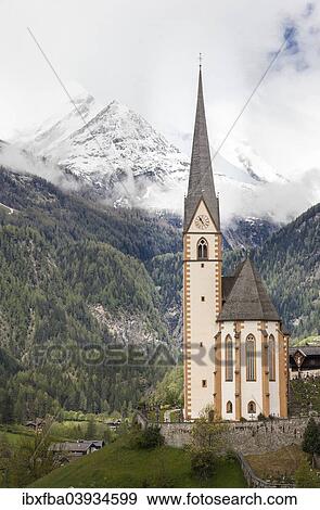 Stock Photo - "Parish church of Heiligenblut, Grossglockner, Heiligenblut, Carinthia, Austria, Europe". Fotosearch