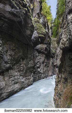 Stock Image - "Partnachklamm gorge, Partnach river, Garmisch-Partenkirchen, Werdenfelser Land region, Wetterstein range, Upper Bavaria, Bavaria, Germany, Europe". Fotosearch