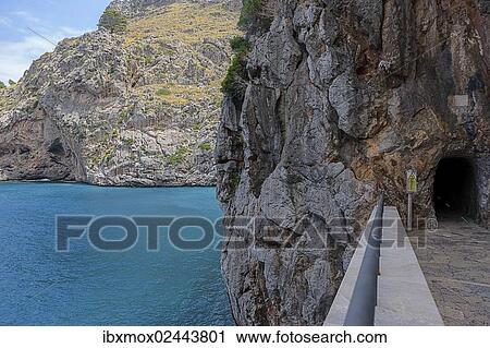 "Path through rocks to the hidden Bay of Sa Calobra, Tramuntana Mountains, Majorca, Balearic Islands, Mediterranean Sea, Spain, Europe" View Large Photo Image Stock Image - "Path through rocks to the hidden Bay of Sa Calobra, Tramuntana Mountains, Majorca, Balearic Islands, Mediterranean Sea, Spain, Europe". Fotosearch