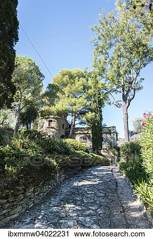 Stock Image - "Path towards a small castle, Saint-Florent, Golfe de Saint-Florent, Corsica, France, Europe". Fotosearch