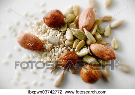 "Peanuts, sunflower seeds and sesame seeds" View Large Photo Image Stock Image - "Peanuts, sunflower seeds and sesame seeds". Fotosearch