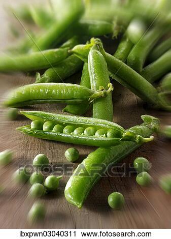 Peas and pea pods View Large Photo Image Stock Image - Peas and pea pods. Fotosearch
