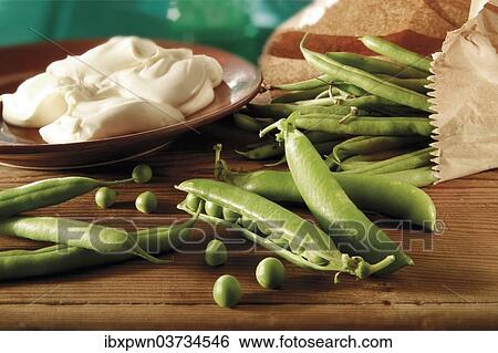 Peas and pea pods View Large Photo Image Stock Photograph - Peas and pea pods. Fotosearch