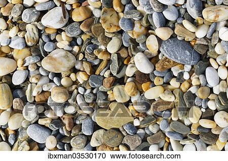 Stock Image - "Pebbles on a beach, Dilek National Park, Kusadasi, Aydin province, Aegean region, Turkey, Asia". Fotosearch