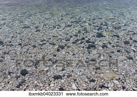 "Pebbles on the beach of La Olla in Altea, Alicante, Costa Blanca, Spain, Europe" View Large Photo Image Stock Image - "Pebbles on the beach of La Olla in Altea, Alicante, Costa Blanca, Spain, Europe". Fotosearch