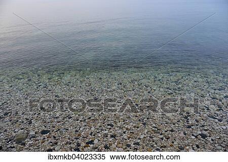 "Pebbles on the beach of La Olla in Altea, Alicante, Costa Blanca, Spain, Europe" View Large Photo Image Stock Photography - "Pebbles on the beach of La Olla in Altea, Alicante, Costa Blanca, Spain, Europe". Fotosearch
