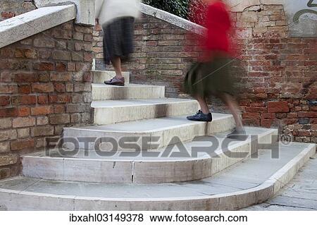 "People climbing the steps of a footbridge, Venice, Venezien, Italy, Europe" View Large Photo Image Stock Photo - "People climbing the steps of a footbridge, Venice, Venezien, Italy, Europe". Fotosearch