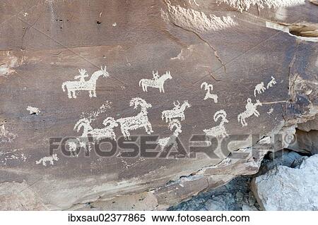 "Petroglyphs of the Ute Indians, animals and riders on horseback carved in a rock, Arches National Park, Utah, Western United States, United States of America, North America" View Large Photo Image Stock Photography - "Petroglyphs of the Ute Indians, animals and riders on horseback carved in a rock, Arches National Park, Utah, Western United States, United States of America, North America". Fotosearch