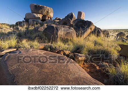 Stock Image - "Petroglyphs, rock engravings of the Bushmen or San, near Kenhardt, Northern Cape, South Africa, Africa". Fotosearch