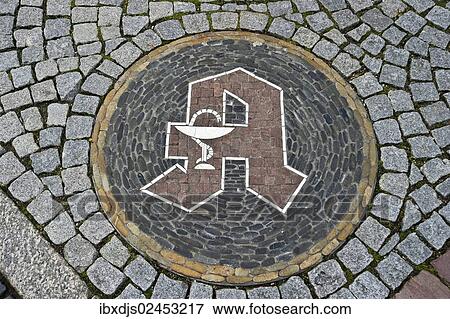 "Pharmacy symbol, a stone mosaic in front of a pharmacy, Freiburg, Baden-Wuerttemberg, Germany, Europe" View Large Photo Image Stock Photo - "Pharmacy symbol, a stone mosaic in front of a pharmacy, Freiburg, Baden-Wuerttemberg, Germany, Europe". Fotosearch