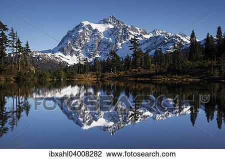 Stock Image - "Picture Lake and Mount Shuksan in the Northern Cascades, Cascade Range, Rockport, Washington, United States, North America". Fotosearch