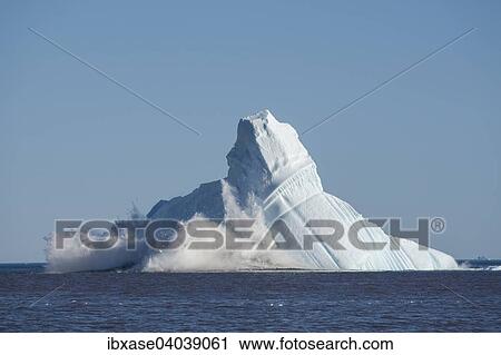 "Pieces breaking off an enormous iceberg causing it to unbalance and collapse, Qeqertarsuaq, Disko Bay, Greenland, North America" View Large Photo Image Stock Image - "Pieces breaking off an enormous iceberg causing it to unbalance and collapse, Qeqertarsuaq, Disko Bay, Greenland, North America". Fotosearch
