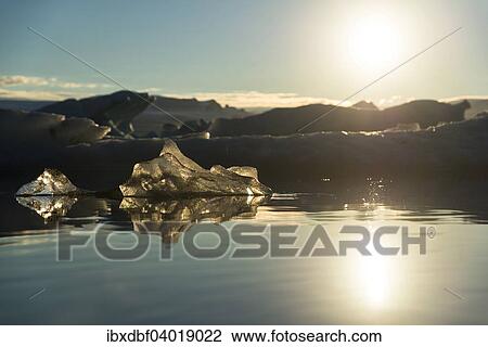 "Pieces of ice in the evening light, reflection, Jokulsarlon glacier lagoon, Vatnajokull Glacier, East, Iceland, Europe" View Large Photo Image Stock Image - "Pieces of ice in the evening light, reflection, Jokulsarlon glacier lagoon, Vatnajokull Glacier, East, Iceland, Europe". Fotosearch