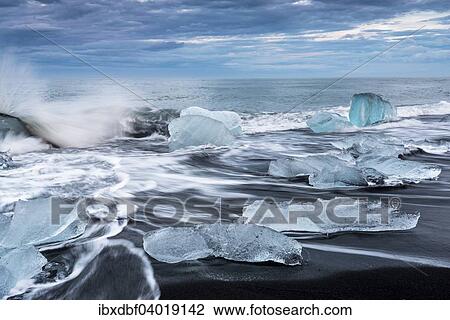 "Pieces of ice on the black beach lapped by the sea, at Jokulsarlon Glacial Lagoon, Vatnajokull Glacier, Eastern Region, Iceland, Europe" View Large Photo Image Stock Image - "Pieces of ice on the black beach lapped by the sea, at Jokulsarlon Glacial Lagoon, Vatnajokull Glacier, Eastern Region, Iceland, Europe". Fotosearch