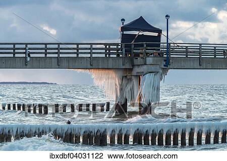 "Pier, snow-covered groynes, icicles, evening light, Baltic Sea, Zingst, Fischland-Darss-Zingst pensinsula, Mecklenburg-Western Pomerania, Germany, Europe" View Large Photo Image Stock Image - "Pier, snow-covered groynes, icicles, evening light, Baltic Sea, Zingst, Fischland-Darss-Zingst pensinsula, Mecklenburg-Western Pomerania, Germany, Europe". Fotosearch