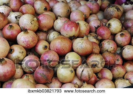 "Pile of pomegranates, market stall at the annual All Saints Market, Cocentaina, Alicante province, Spain, Europe" View Large Photo Image Stock Image - "Pile of pomegranates, market stall at the annual All Saints Market, Cocentaina, Alicante province, Spain, Europe". Fotosearch