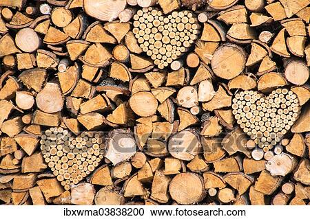"Pile of wood with wooden hearts, Tyrol, Austria, Europe" View Large Photo Image Stock Image - "Pile of wood with wooden hearts, Tyrol, Austria, Europe". Fotosearch