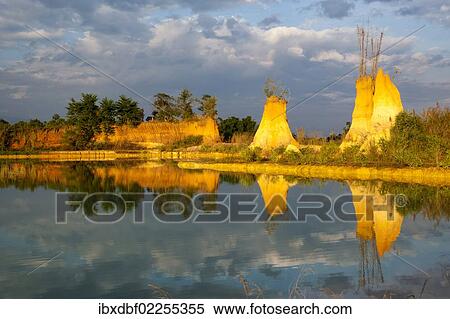 "Piles of clay, reflection, northern Thailand, Thailand, Asia" View Large Photo Image Stock Photography - "Piles of clay, reflection, northern Thailand, Thailand, Asia". Fotosearch