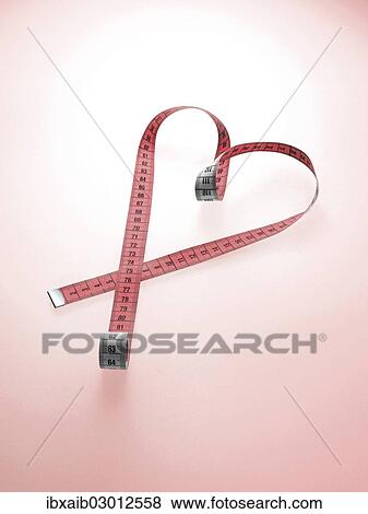Pink tape measure shaped as a heart View Large Photo Image Stock Photo - Pink tape measure shaped as a heart. Fotosearch