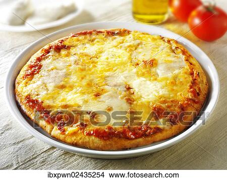 "Pizza Margherita, with three kinds of cheese" View Large Photo Image Picture - "Pizza Margherita, with three kinds of cheese". Fotosearch