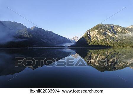 Picture - "Plansee Lake, Ammergau Alps, Ammergebirge Mountains, looking towards Thaneller Mountain in the Lechtal Alps, Tyrol, Austria, Europe, PublicGround, Europe". Fotosearch