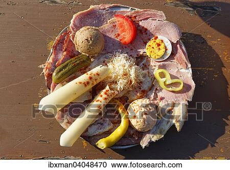 Stock Image - "Plate with cold cuts in Buschenschank, Csaterberg, Kohfidisch, Southern Burgenland, Burgenland, Austria, Europe". Fotosearch