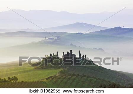 "Podere Belvedere in the morning fog, San Quirico, Val d'Orcia, Tuscany, Italy, Europe, PublicGround, Europe" View Large Photo Image Stock Photography - "Podere Belvedere in the morning fog, San Quirico, Val d'Orcia, Tuscany, Italy, Europe, PublicGround, Europe". Fotosearch
